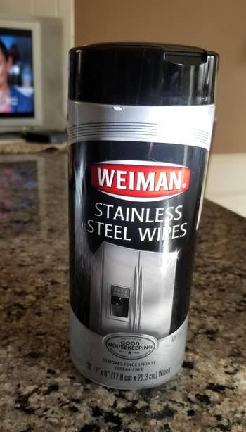 Weiman Stainless Steel Wipes instrumentality  connected  a countertop, featuring a Good Housekeeping seal. Suitable for cleaning stainless alloy  surfaces
