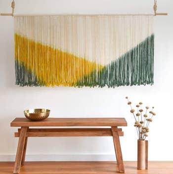 horizontal yarn wall art with color blocked design