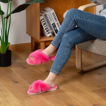 model wearing the slippers in hot pink
