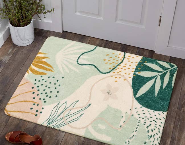 the floral rug by a front door