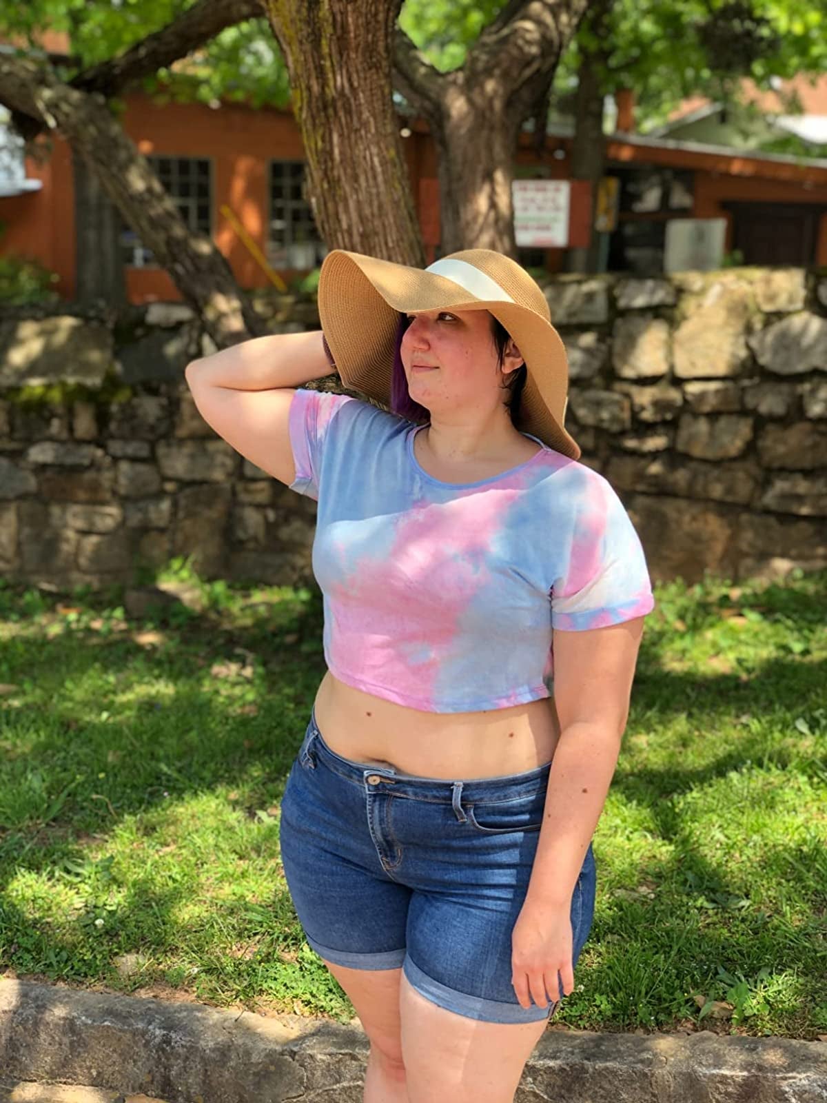 reviewer wearing a blue and pink tie-dye crop top