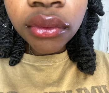 reviewer wearing the appleberry shade on their lips