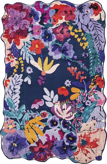 the colorful blue floral area rug