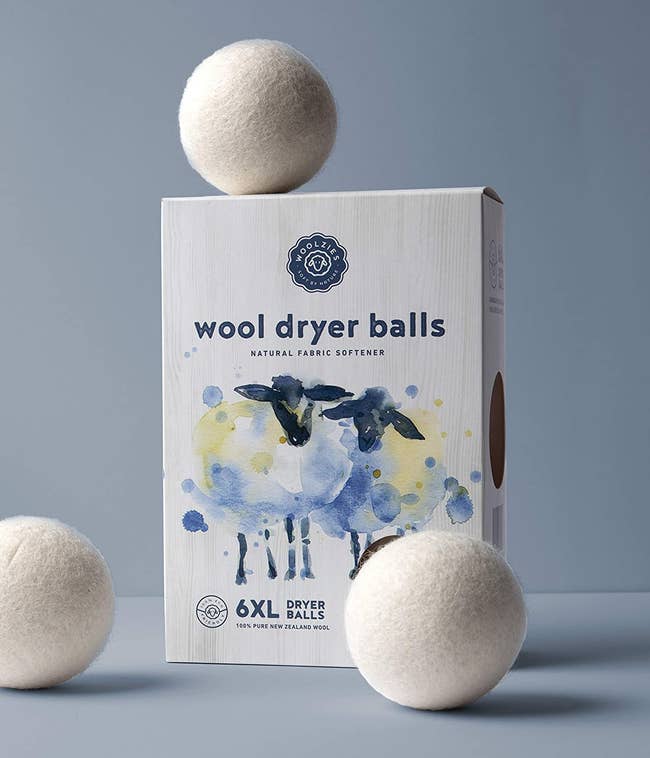 The white large wool balls and the box they come in