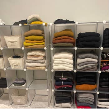 reviewer photo of folded clothes in storage cubes