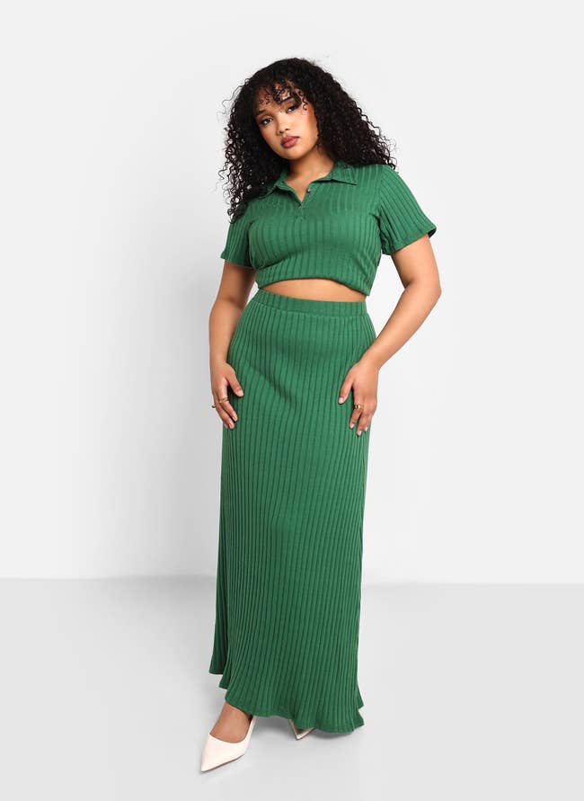 model wearing green knit maxi skirt