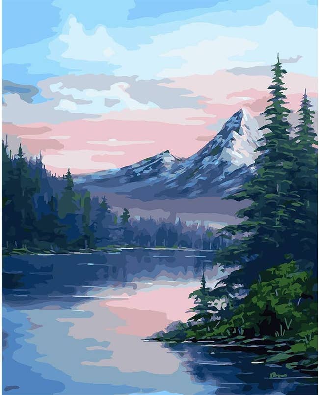 water color painting of a mountain by a lake in a forest 