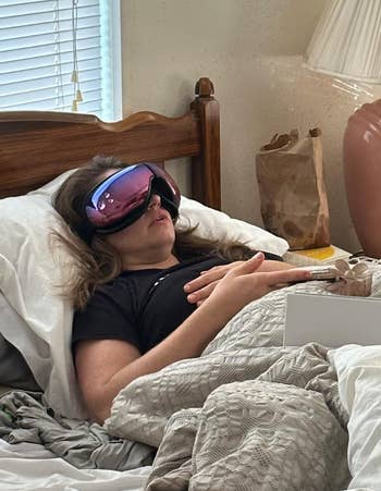 reviewer sleeping successful furniture and wearing massager