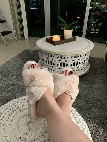 reviewer in pink slippers