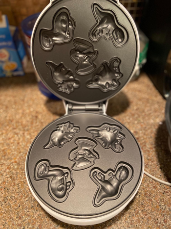 Reviewer image of the black dinosaur waffle maker
