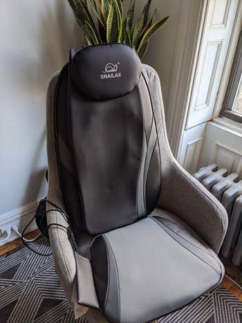 Reviewer photo of office chair with massage chair pad on it