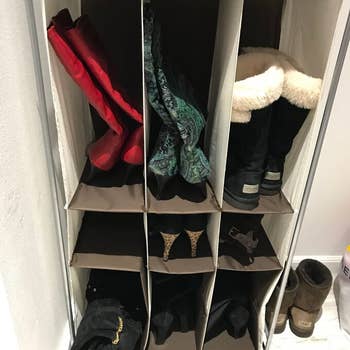 reviewer photo of boots in storage shelf