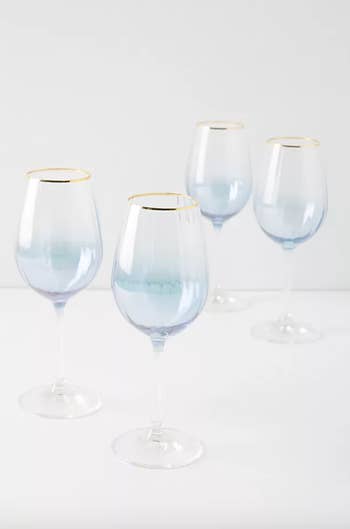 the same wine glasses in a blue ombre color