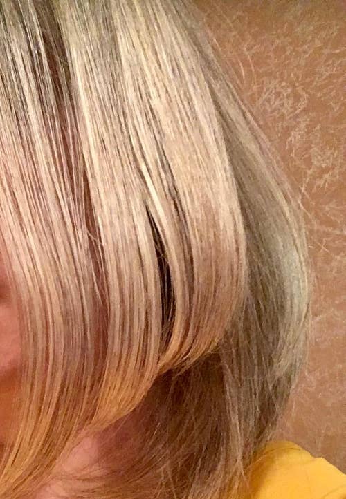 Reviewer image of short blonde hair straightened