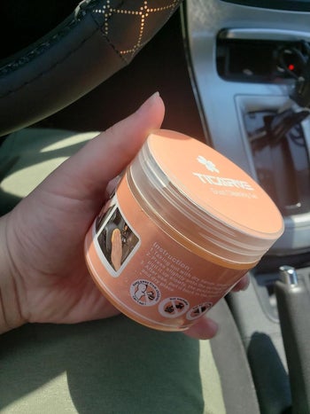 Reviewer holding the putty gel