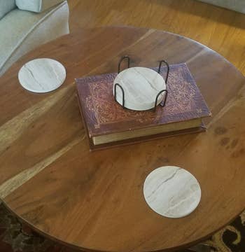 reviewer photo of marble coasters on table