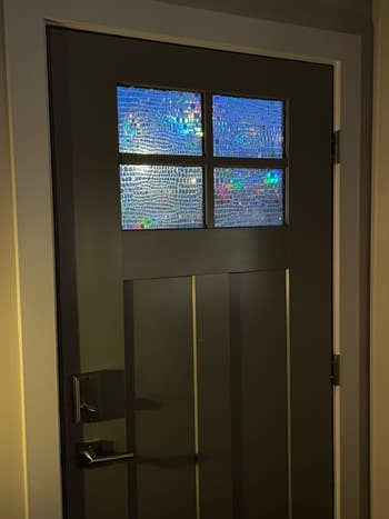 Window privateness movie with a mosaic signifier decorates a door's precocious solid panels, adding privateness portion allowing airy to enter