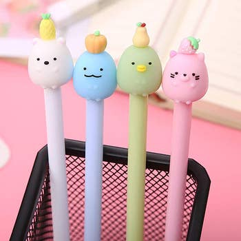 pens with animals with fruits connected  their heads