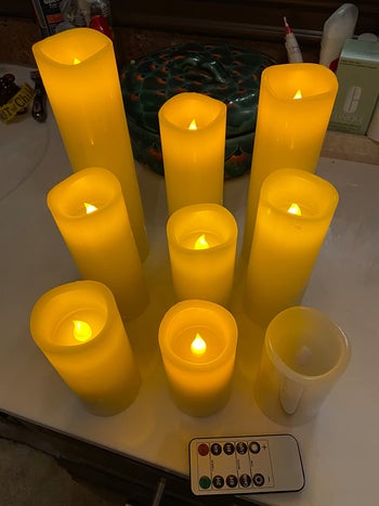 a reviewer's photo of battery-operated candles glowing