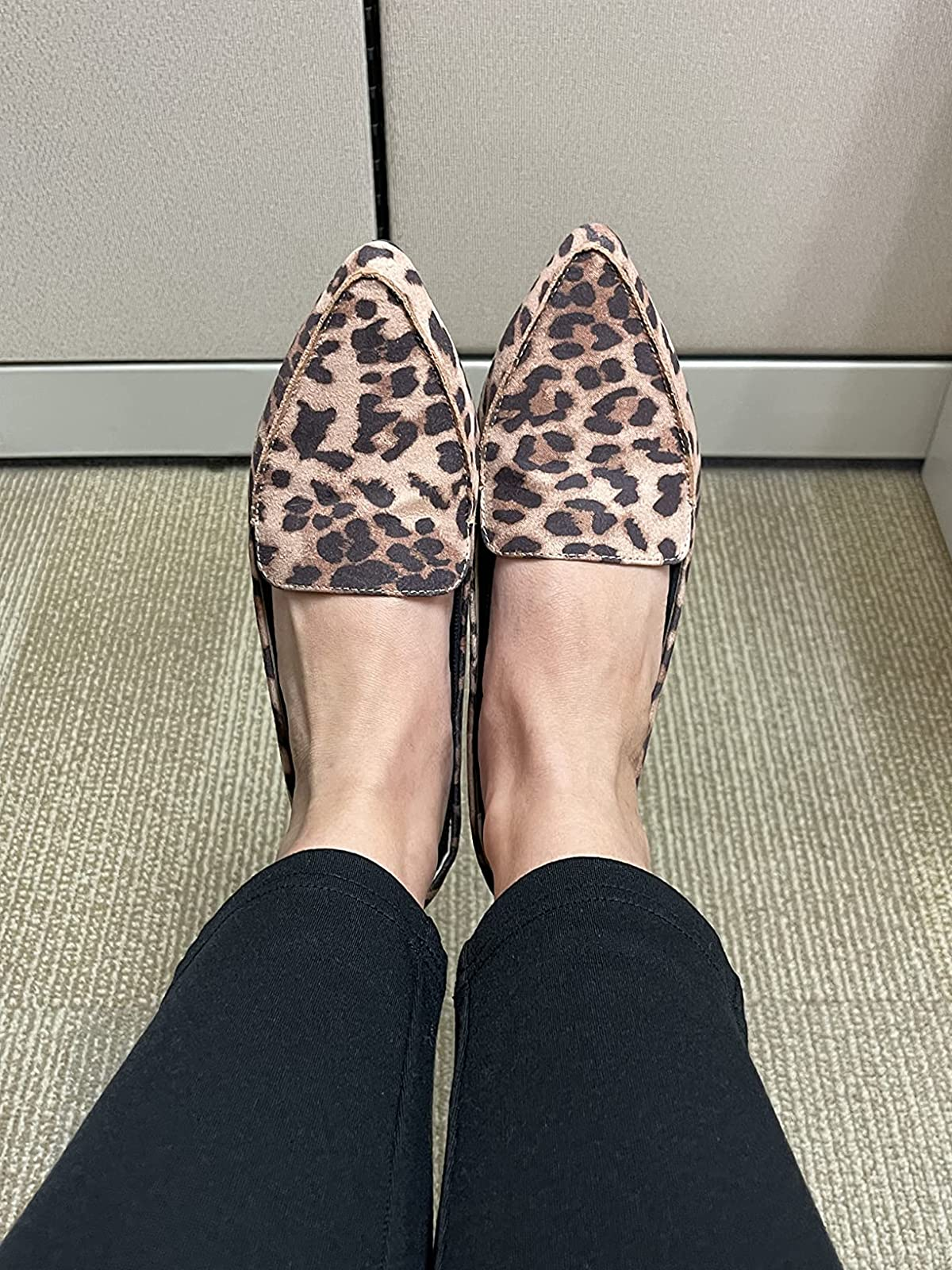 reviewer wearing the leopard people     loafers