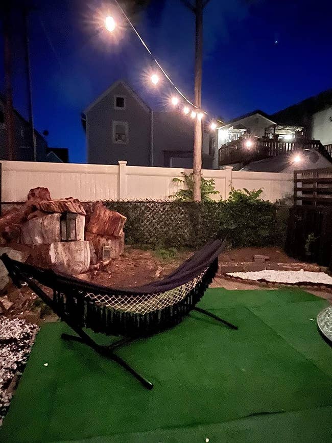 hammock placed in the corner of reviewer's backyard