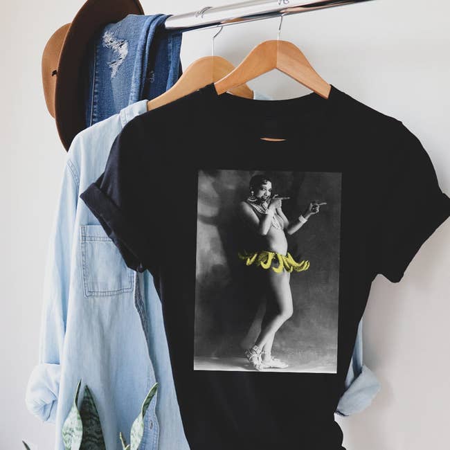black shirt with josephine baker graphic hanging up