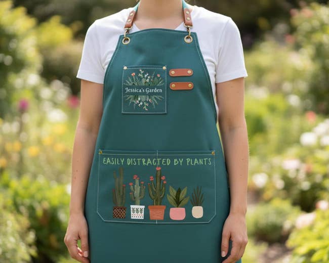 Person wearing a gardening apron with works illustrations, substance reads