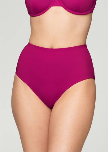 Model wearing high waisted bottoms in orchid