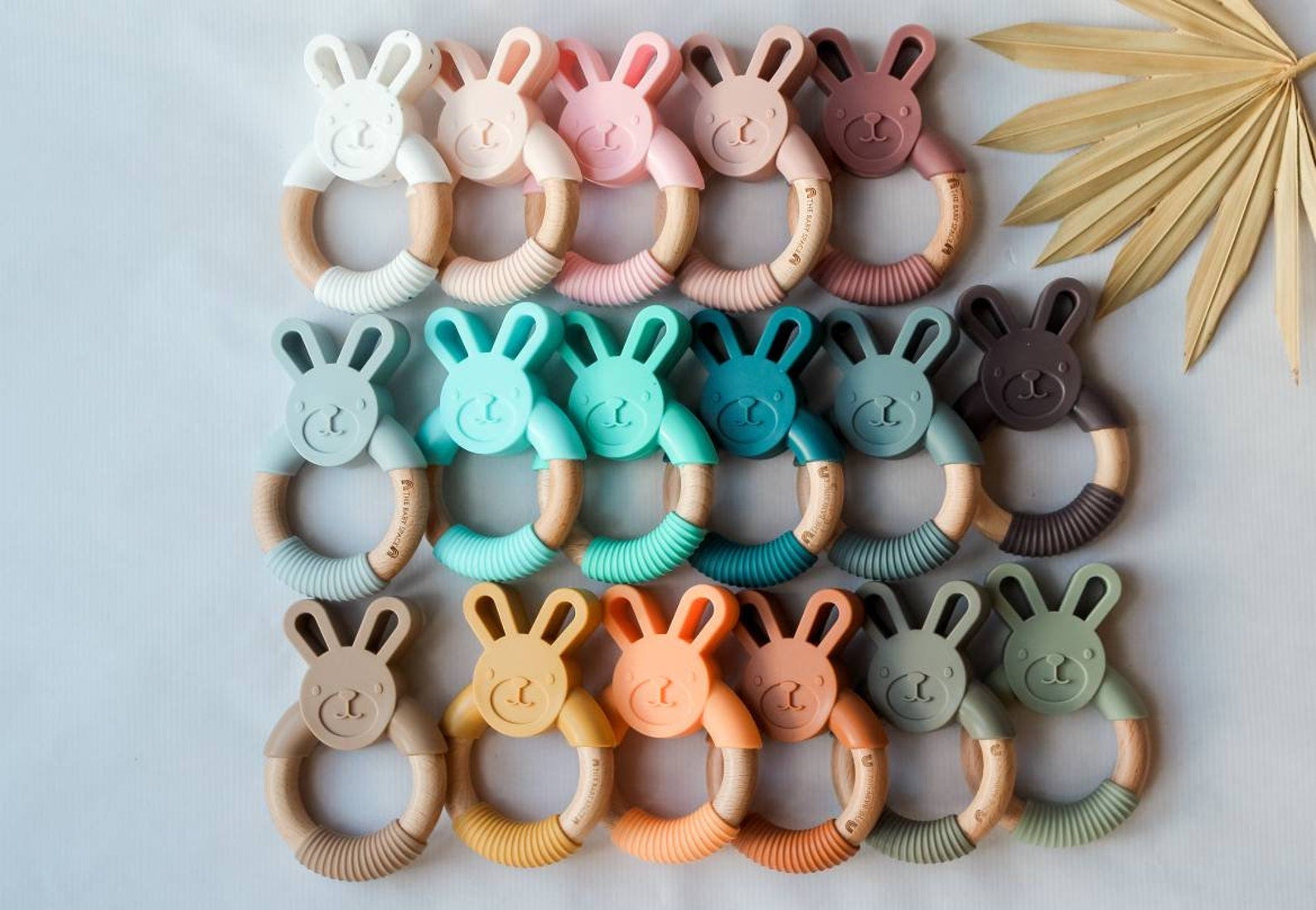 The silicone and wood bunny rings in various colors