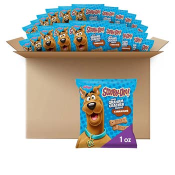 A box filled wit packs of Scooby-Doo graham crackers and a close-up of one of the bags