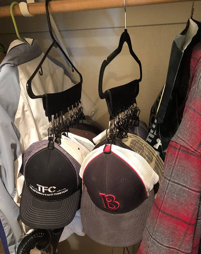 a reviewer's two hat hangers in a closet
