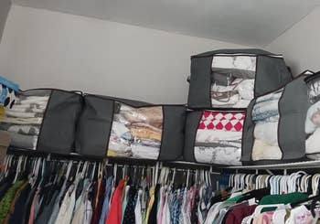 reviewers storage cubes filled with items and stored on top shelf of closet