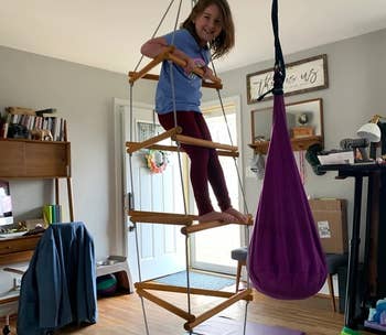Reviewer's photo of a child climbing the rope ladder