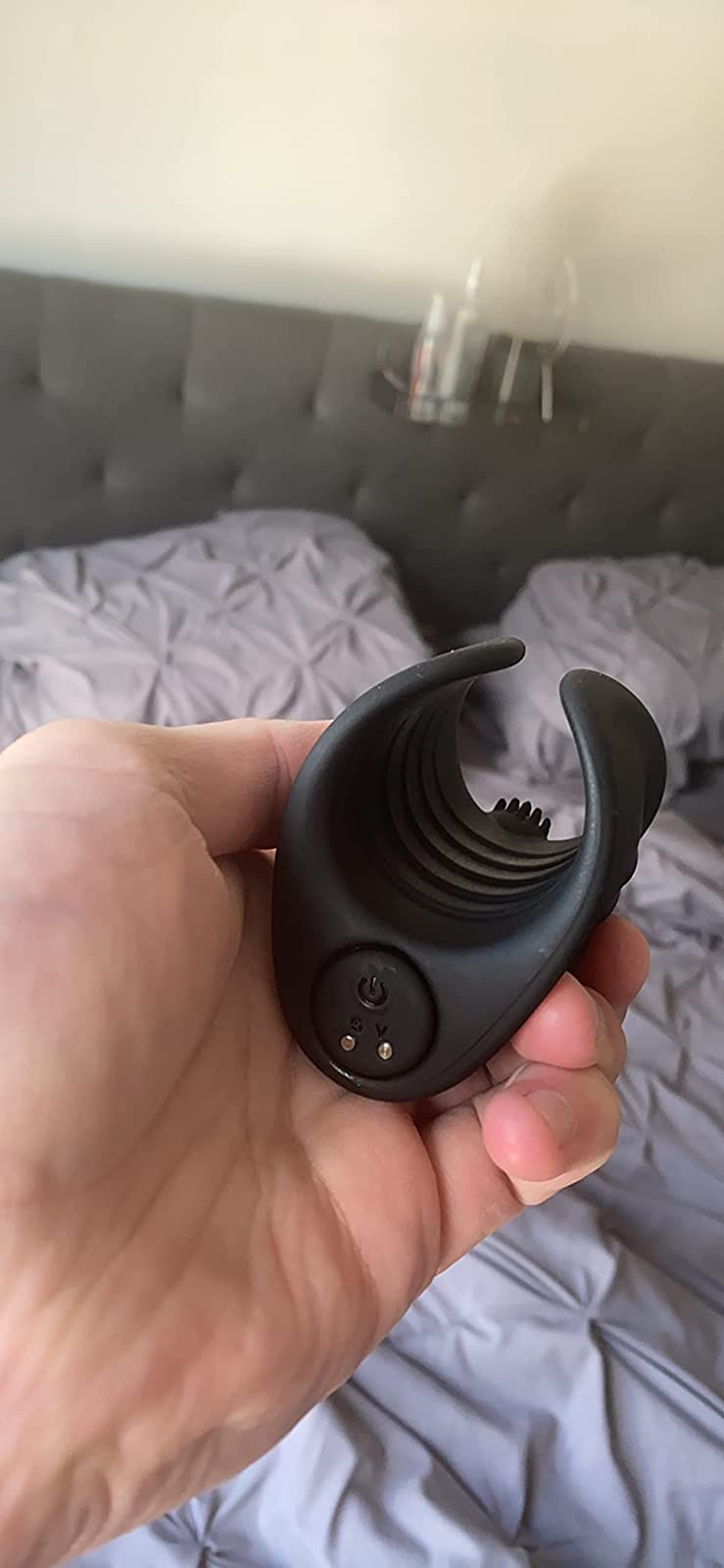 Reviewer displaying removable bullet and textured piece