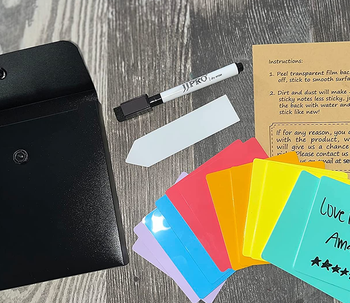 reviewer photo of the pack of assorted sticky notes with their dry erase pen