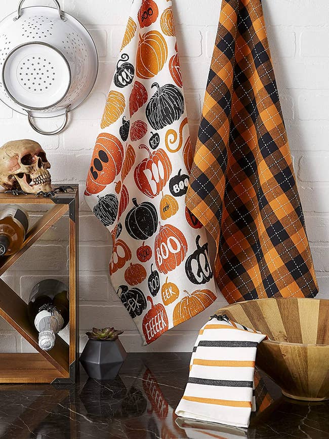 the dish towels hanging in the kitchen
