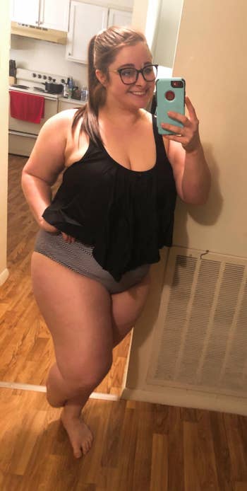 reviewer posing in mirror picture wearing bathing suit