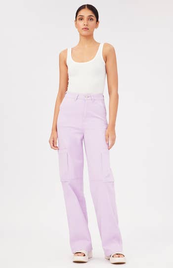 model in the lavender cargo pants