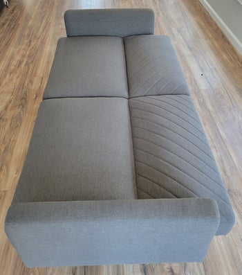 same reviewer's photo of the sofa converted to futon bed