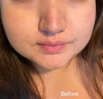 Close-up of a person's look   with a absorption   connected  their tegument  texture, featuring minimal makeup. The connection     