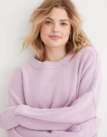 model wearing the sweater in lilac