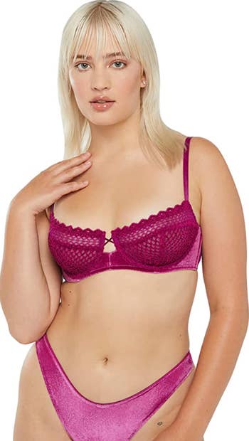 another model wearing the bra in purple