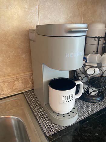 The grey mini Keurig