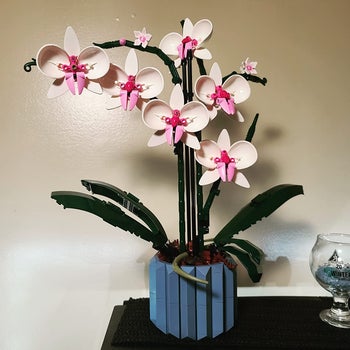 the lego orchid bouquet on a table