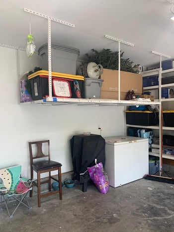 reviewer image of the storage rack in white in their garage