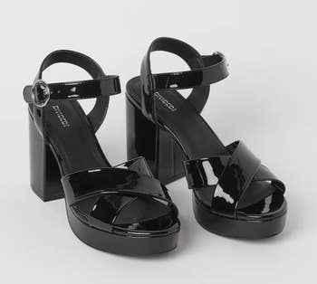 the pair of black platform sandals