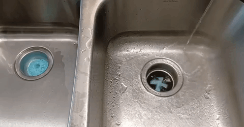 GIF of reviewer's sink foaming up with garbage disposal cleaner
