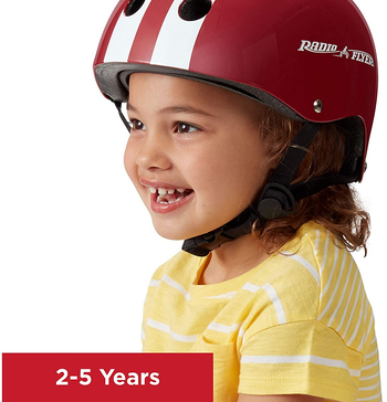 Child model wearing red Radio Flyer helmet with white stripes