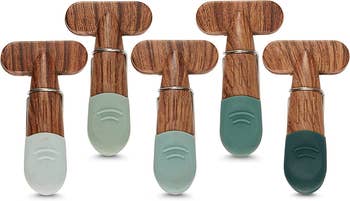 the faux wood clips with green rubber handles