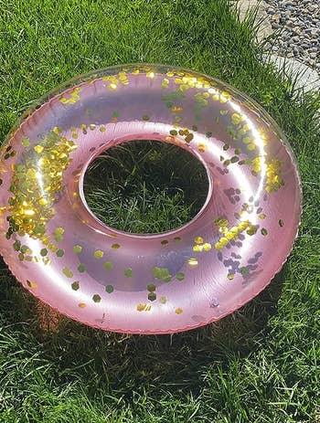 Reviewer's pink floatie on the grass